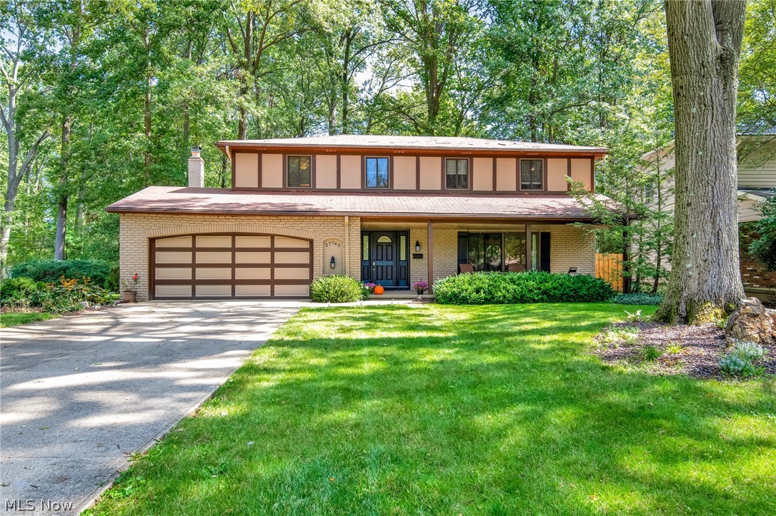 Lovely, brick-front colonial on a spectacular cul-de-sac in sought-after neighborhood! Most of this home has been renovated in the last couple of years including wonderful, new kitchen with white shaker cabinetry, marble subway backsplash, stainless appliances, large pantry, large eat-in area...with a step-down to a cozy family room with slider to rear yard and white, brick, wood-burning fireplace wall! New half bath! (layout was changed to accommodate a first-floor half bath and a more functional garage entry) Large foyer open to spacious living room with huge picture window! Dining room has windows to rear and can extend into living room to accommodate larger gatherings! Very neutral, cool decor! Engineered hardwood flooring throughout! White, vinyl replacement windows! White wood blinds! Ceiling fans! Open staircase leads to second floor hall to three good-sized bedrooms and lots of storage with three hall closets! Huge master suite with slider to unique second floor porch, walk-in