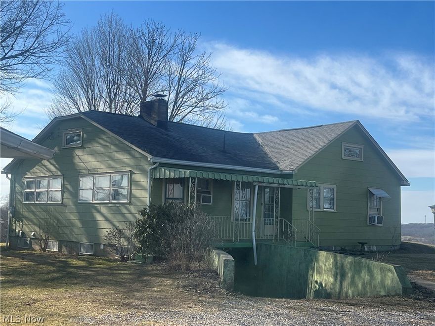 ON TOP OF THE WORLD!!  AND THE VIEWS ARE AMAZING!!! This first time offered property will take your breath away with its stunning 360 degree views!!!  You can see for miles!! The acreage being offered-almost 5 acres is the perfect place to build your new ESTATE!  Rolling, level, wooded and scenic I think best describes this one of a kind property in city limits with access to all of the amenities our beautiful town offers!!  Make your appointment today!!