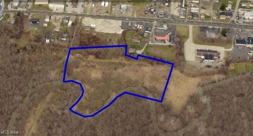 Exceptional opportunity to own over 7 acres of commercially zoned land located just minutes from Interstate 77.