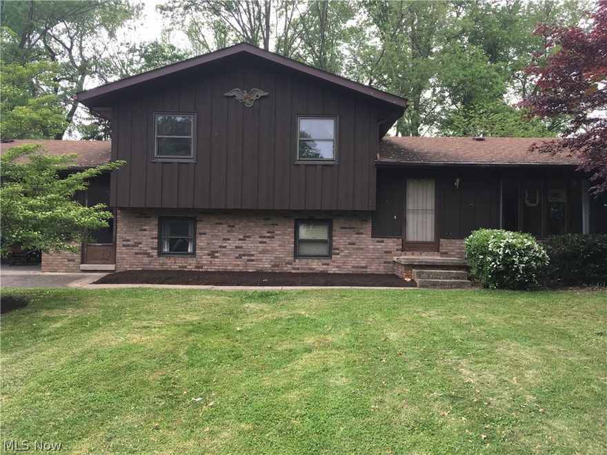 Welcome home to this solid 3 bedroom 2 bath Brimfield split level home featuring a wonderful floor plan, many updates and a large yard.  Bring your style and cosmetic updates and make this home yours, Schedule your private showing today!