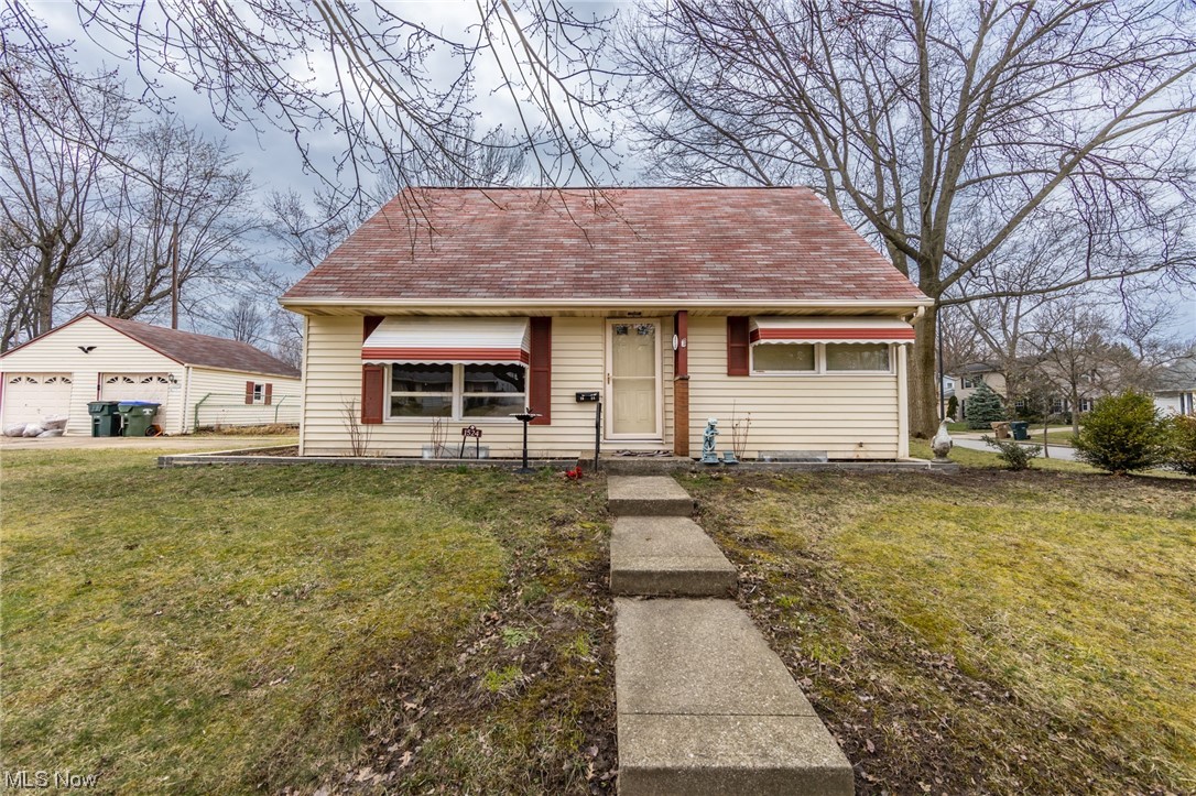 Welcome to this cute cape cod in Cuyahoga Falls! Convenient one bedroom on the main floor as well as one full bathroom. The second floor has two bedrooms and one full bathroom. Both bathrooms have been updated. Freshly painted walls throughout. Hot water tank new in 2023. Covered porch with fenced in backyard and a two car garage. Well maintained and great location! Call for your private showing today.