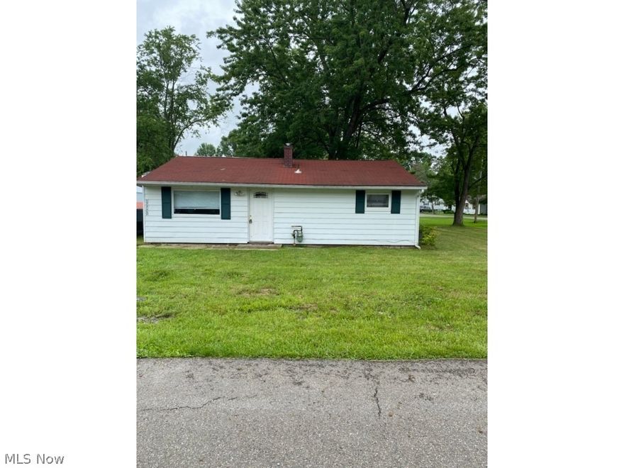 Updated interior with new wood vinyl in soothing greys and tans with grey and white paint throughout. Features two bedrooms and one full bathroom, large family room and kitchen.  Rear enclosed large deck/yard for pets or playing. Lake Milton, Beach and park just down the street. 
Home sale includes additional single lot to right of house