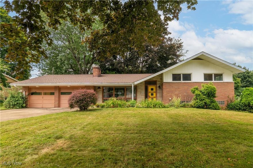 Endless potential in a prime location! This 3-bedroom, 2-bathroom split-level home is full of opportunity and charm, nestled in the desirable North Canton School District. The inviting great room features vaulted ceilings and a cozy fireplace, creating a spacious and welcoming atmosphere. Start your day in the bright sunroom, perfect for morning coffee or quiet evenings. The lower level offers a walk-out to a private backyard, ideal for outdoor relaxation or entertaining. Don’t miss your chance to bring your vision to life in a fantastic neighborhood!