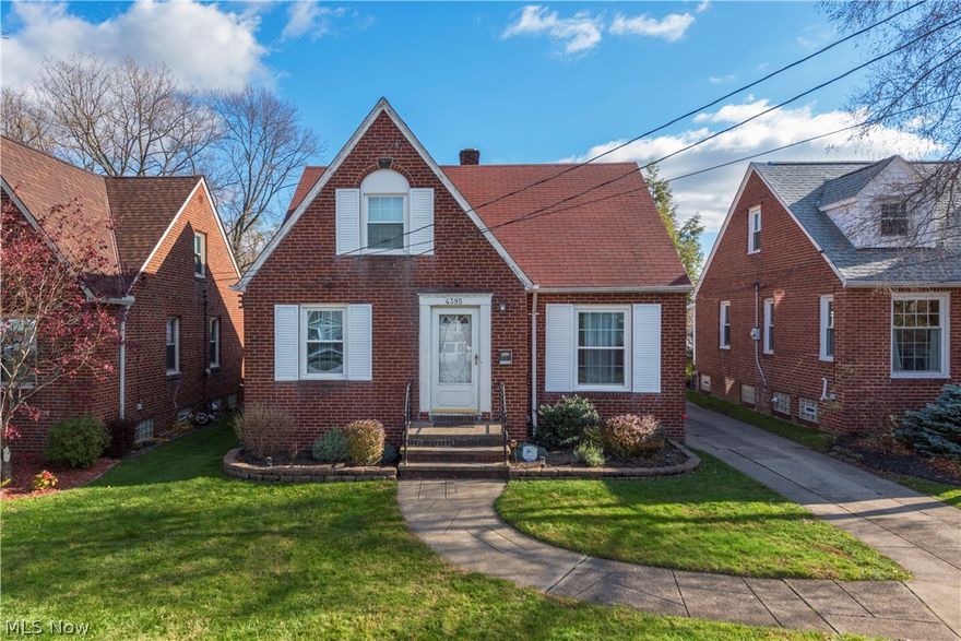 This adorable brick bungalow is nestled in the heart of South Hills. The home is steps away from Harmody Park; minutes from the Jennings freeway and downtown Cleveland. The home boasts 3 bedrooms with original hardwood floors. The kitchen has hand laid ceramic tile and an abundance of cabinetry. The yard is fenced in and has mature maintenance free landscaping. The electric stove is 6 months old and the french door stainless steel refrigerator is brand new! The home has an alarm system and security cameras that stay with the home. There is a gas line in the basement if you choose to convert the stove to gas operation. Schedule a showing today...where homeownership is more affordable than renting!