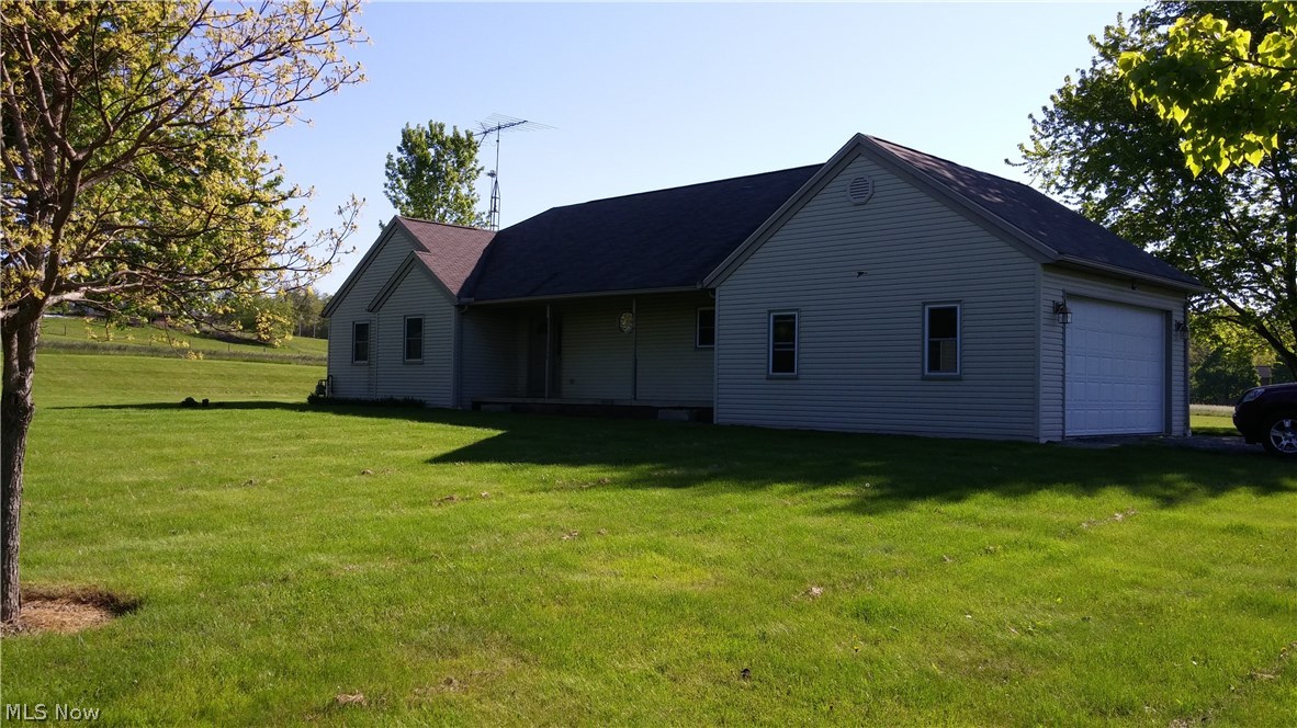 Wow! How often does almost five acres come up for sale in the heart of Kidron!! Plus a workshop/horse stall barn with loft! Plus a ranch house (built in 1995) with four full bedrooms and large walk-in closet. Large deck (35x16) which has doors from the master bedroom and the living room. A finished basement with family room, full bath, 4th bedroom and a fruit cellar. A great place to call home!