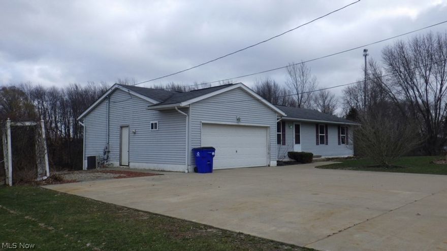 Rare find ..Country living with scenic views ! Over 2 acres with views of rolling hills and woods !! Features 3/2 with partially finished walk out bsmt ..This newer home has so many possibilities ..Large concrete drive allows for extra parking as well ...Recent updates include new paint , carpet and kitchen fixtures ..The best part is the deck that overlooks the beauty as well as the large extra finished space with 2nd bath and util room ..Options to finish even more to enjoy this walk out bsmt more fully .. So many things to love about this one ..Won't last priced to sell .. Have a look today ...Multi offers exist .