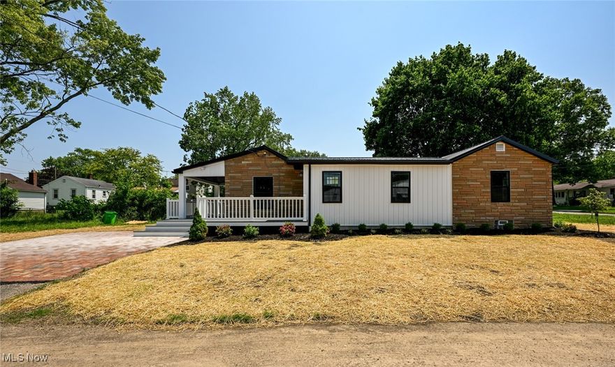 Fully Remodeled Ranch in Barberton – Move-In Ready Perfection! Welcome to where comfort meets modern style in this beautifully updated ranch-style home offering convenient one-floor living. Boasting 3 bedrooms and 2 full bathrooms, this home has been thoughtfully remodeled from top to bottom. Step into the stunning new kitchen with vaulted ceilings that extend through the kitchen and dining area, creating an airy, open feel. The renovations continue throughout with new flooring, windows, roof, appliances, and completely updated bathrooms—everything has been done for you. Enjoy outdoor living on the beautiful deck, overlooking a large yard that’s perfect for relaxing, entertaining, or letting pets and kids play freely. This is a turn-key home with all the modern updates today’s buyers are looking for. Don’t miss your chance to own a completely renovated gem in a quiet, welcoming neighborhood of Barberton.