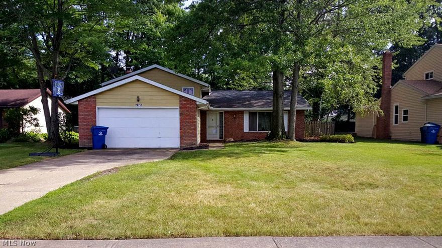 Nicely updated 3 bedroom 1.5 bath split on wooded lot. Vaulted living room open to the dining room. Neutral throughout. Ceramic tile floors throughout main living level. Eat-in kitchen with loads of storage and updated appliances. Dinette opens to patio and large back yard through sliders. 3 bedrooms and updated bath on 2nd. 1st floor family room with wood burning fireplace and half bath. Attached 2 car garage off laundry room. Nice yard. Quiet street. Close to amenities and freeways.