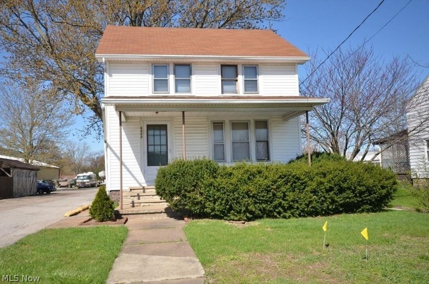 This is a fantastic prime commercial location consisting of 2 Parcels and 4 building structures.  Owners just spent ~$100,000 for a new sewer tap. The 1st structure is a home, 2nd is a detached garage, 3rd structure is a bar (could be any type of business), and 4th an outbuilding with tons of storage.  Possibilities are endless.  Could live in the home and have your business.  Front parcel has 100' street frontage and depth of `198'.  Front parcel contains a 2 story house with previous rental income of $800 per month (could possibly be higher as this was a few years ago). Also, on the front parcel is a business building of approximately 1000 sq.ft. previously operated as a bar (rental was $800), no liquor license, (would need to apply for one), with rear patio and enclosure. The buildings are separated by a wide drive with ample parking. These two rentals could pay your mortgage if needed. The rear parcel is accessed from the driveway. It contains a huge 44 by 65 pole barn with a 16 by 16 front garage door. This building is perfect for vehicle/boat storage or to house any type of small business equipment needs (rental is $300 plus $75 towards electric). The area surrounding the structure is a fenced, gravel parking storage area. Additional parcel number 06-23-011-101-074 is included in lot size and tax.
