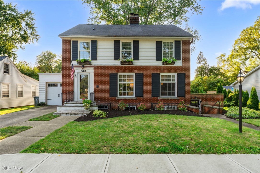 Rare opportunity in Harbour Town’s Historic District! This 4-bedroom, 3-bath brick Colonial is a two minute walk from Main Street Beach and steps from restaurants, festivals, marinas, boat clubs, and Ritter Public Library. Features include an attached 2-car tandem garage with additional storage space—could also function as small boat storage. Hardwood floors throughout with exception of herringbone brick in the updated kitchen. Eat in kitchen also features subway tile, granite counters, and stainless steel appliances, an oversized living room with wood-burning fireplace, formal dining room, library/den, and an updated full bath on the first floor. Upstairs offers three oversized bedrooms and another updated full bath, while the nicely finished walk-up lower level with additional separate entrance includes a large rec room, 4th bedroom, 3rd full bath, and spacious laundry room. A back porch/mudroom and unfinished attic with potential complete this exceptional home. Owner is a licensed Ohio Realtor.