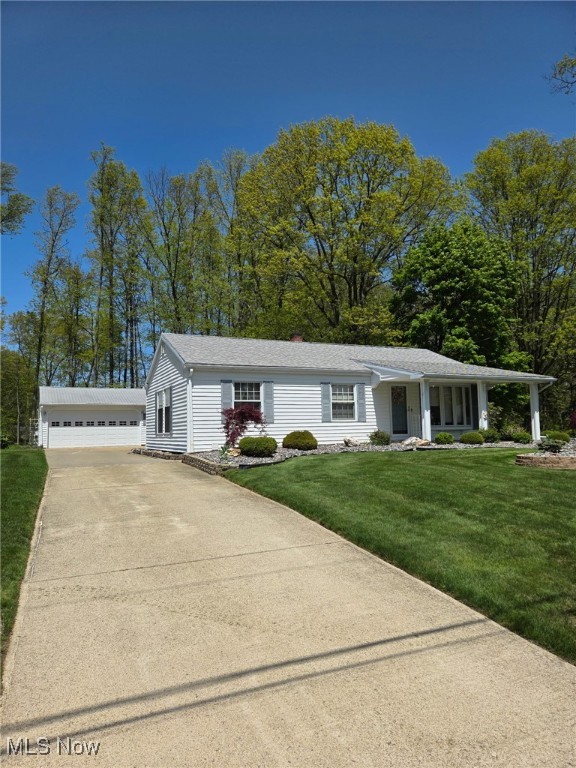 Comfortable, well-kept ranch home only a few blocks from Lake Erie sitting on .20 acre lot in Saybrook Twp. The kitchen has oak cabinets, range, refrigerator, and dishwasher and opens to the dining area. The relaxing family room overlooks the park-like backyard and a bay window in the living room peers out to the front yard. 3 nice sized bedrooms and a full bath finish off the main level of the home. The basement offers itself up to finishing a rec room for additional living space. The basement workshop area is approx 16 X 11 and the laundry room has the washer, dryer and a laundry sink. Outside, the concrete driveway leads to a detached 2 car garage and a storage shed with a concrete floor. Lots of beautiful stone landscaping and springtime flowers. Don't miss out on this Harbor home!