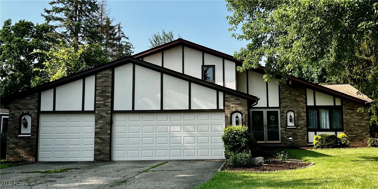 It is time to call this beautiful split-level in a sought-after Strongsville neighborhood your new home! This well
constructed 4-bedroom (one on first floor perfect for remote work office) 2.5 bath house sprawls over 2100 square feet
and features a three seasons room as well as a three-car garage. Highlights of this property include luxury vinyl and
ceramic tile flooring, Anderson windows, finished basement level and a large outside deck that overlooks a full half
acre of land with shed that is equipped with electric. In addition to all of this, mechanicals have been updated, all
appliances stay and the house is move-in ready! Walking distance from drugstore, supermarket, restaurants and
located in the highly rated Strongsville City school district. Don't miss out on this buying opportunity as it certainly
won't last long.