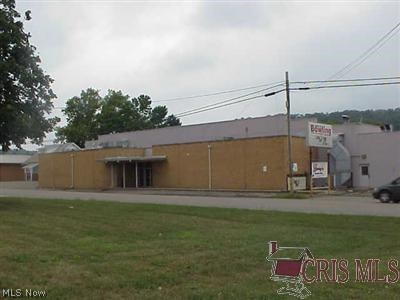 Nearly 4 acres of land and 1 acre under roof presently operated as a 34 lane Bowling Center with snack bar with a liquor license.