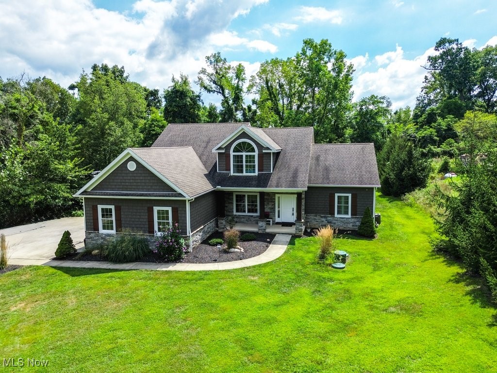 Welcome to this custom-built 3-bedroom home (2015) in Green Local Schools, perfectly situated on a 1-acre lot. Offering the rare combination of land, privacy, and nature, this home feels like a retreat while being just minutes from parks, shopping, and quick highway access. Inside, you’ll love the open layout, spacious bedrooms, and abundant natural light. The owner’s favorite feature—the stunning master bath shower—creates a true spa-like escape. Outdoors, enjoy your own private space surrounded by mature trees and natural beauty, ideal for relaxation or entertaining. Central location makes commuting simple while still giving you the peace of country-style living. Call today to schedule your private showing!