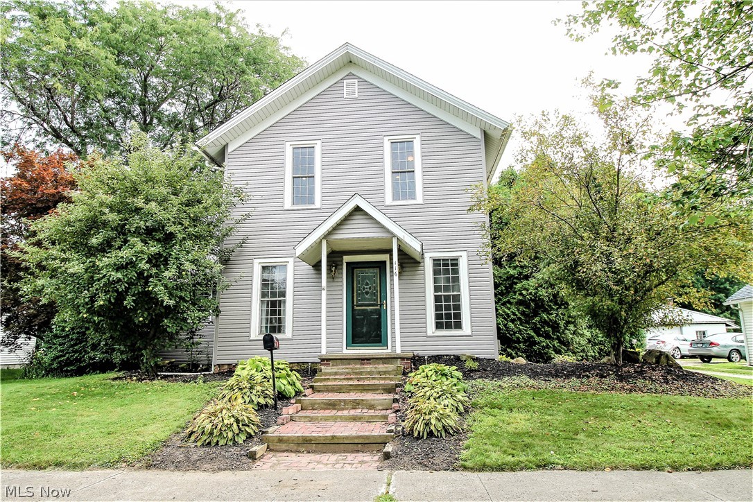 Welcome Home to this freshly painted four bedrooms, with two full baths on a fabulous lot! This home offers a first floor bedroom; with a full bathroom and newer toilet installed in 2017 with massive built ins for extra storage also has washer and dryer. The huge great room would be wonderful for entertaining family and friends. The large open kitchen has stainless steel appliances, stove and fridge newer in 2012, also the dishwasher newer in 2018 and has an abundance of oak cabinets for plenty of storage. This kitchen is spacious enough for a table and chairs to enjoy your morning coffee or read the paper. The first floor offers newer laminate flooring installed in 2017 as well. The living room could be used for your intimate gatherings and is open to the dining room. Upstairs you will find three nice size bedrooms which all have ceiling fans and another full bathroom, extra wide hallway for a sitting area, which completes the upstairs. New rear screen and security door in 2018 goes o