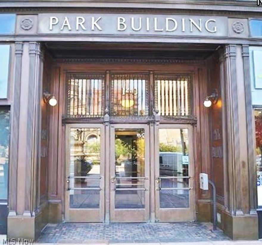 Historic building converted to a select few condominiums.  Custom build out includes original woodwork, original maple and terrazzo floors. Granite, stainless, fabulous cabinetry, high end rebuild for the discerning owner, with dramatic ceiling height throughout.  Fabulous view of Public Square and the Sailors and Soldiers monument.