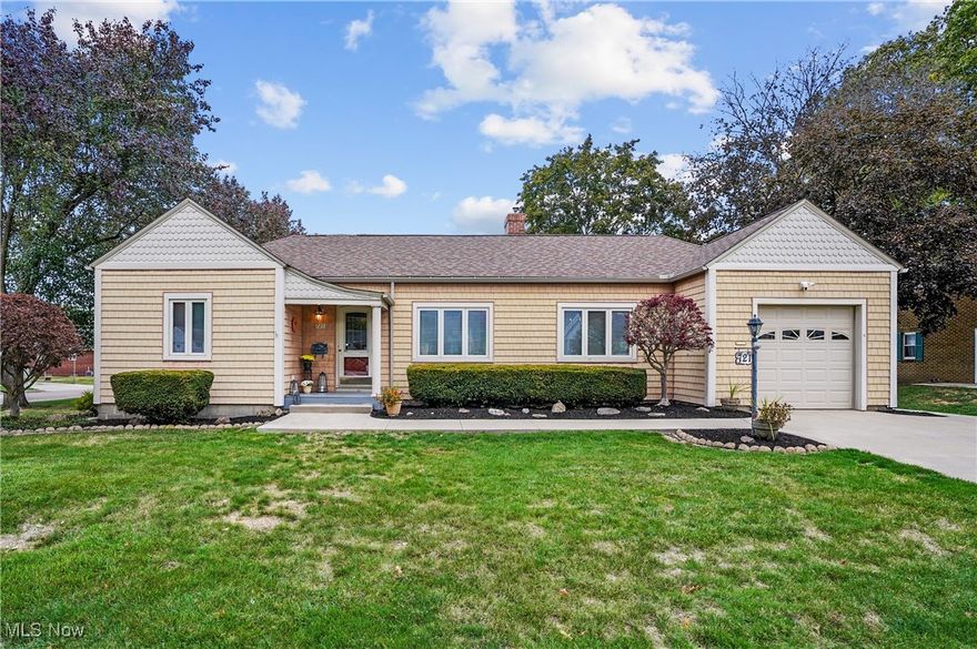 Sprawling Ranch Retreat on Barberton's Beautiful Eastside!
Set on a wonderful cul-de-sac street, this stunning ranch home is surrounded by lush landscaping and timeless curb appeal. Step inside and be greeted by an expansive 24 x 13 living room, anchored by a stately fireplace and seamlessly flowing into a large dining room-ideal for entertaining family and friends.
The chef's kitchen is a true showstopper, boasting abundant granite countertops, a generous peninsula, elegant stone-tiled floors, and a spacious eat-in area. From here, step into the bright 3-season sunroom with its cathedral ceiling, large windows, and views of the beautifully landscaped backyard-plus easy access to the deck and patio for effortless indoor-outdoor living.
This thoughtfully designed 3-bedroom home offers privacy and comfort for everyone. Two bedrooms and a full bath are tucked away on one side of the home, while the impressive primary suite spans the back wing-featuring four closets, a private dressing or office space, and a full ensuite bath-ideal for guests or an in-law setup.
The lower level is both functional and accessible, complete with a stair lift chair, laundry area, workshop, and ample storage-with a convenient exterior walk-up access.
Outside, enjoy an attached single-car garage, a newer extra-wide concrete driveway, plus an additional detached garage with its own drive and parking area-perfect for an RV, camper, or extra vehicles. The tree-lined lot, stone pathways, paver patio, and deck all come together to create a truly peaceful and private outdoor retreat.
Your new home awaits! Come experience the comfort, space, and serenity this Eastside gem has to offer, with the added benefit of a Home Warranty.