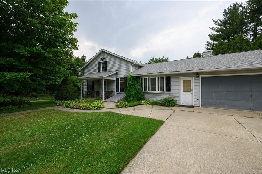 This charming historic home sits right in Rootstown LSD and boasts two parcels with the sale! The large garage behind the home has heat, electricity, and a work office! As you enter the home, you will notice the huge living room and 4 season room that has a pellet burning stove. The large deck is a great way to spend time with family and friends outdoors! The kitchen is located in the heart of the home and provides the space needed to have meals with family and entertain guests. Conveniently, there is a first floor bedroom and first floor laundry! The second floor offers bedrooms and a half-bath. Do not miss your chance to schedule a showing today!