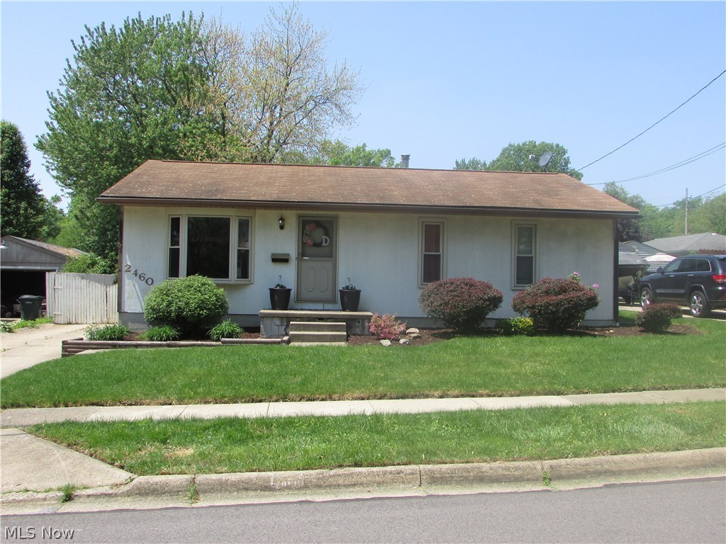 This remarkable 3 bed, 1.5 bath ranch in Cuyahoga Falls has a 2 car garage. The spacious living room features a large bay window. A huge eat in kitchen is separated with a large service bar, and has ample cabinets and counter top space. There is a sun room with duct work off of the rear of the home. The master bedroom has a bathroom as well. The basement has a rec room, and additional rooms set up for all of your needs.