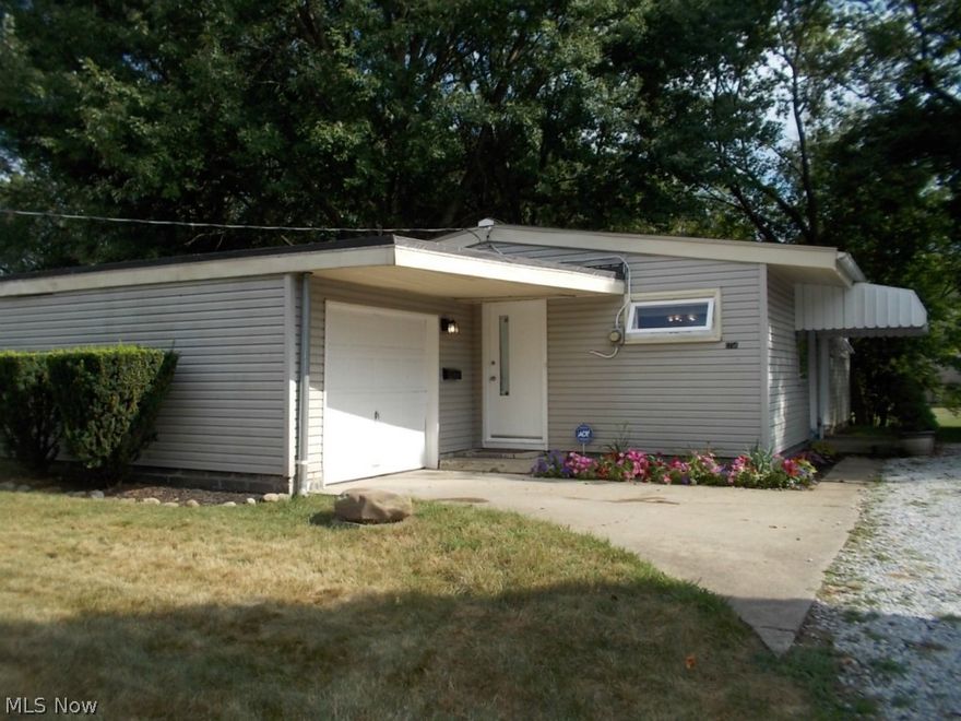 You will LOVE this one!  Move in Condition.  Just remodeled and updated.  New Carpet, Tile, Kitchen Cabinets, Countertops, Appliances, Furnace and more.  Brand New Bathroom with Modern Double Sink and a ceiling hung Rain Shower.  Newly Landscaped Lawn with a park like setting backyard.  Very easy to show.  Call today.