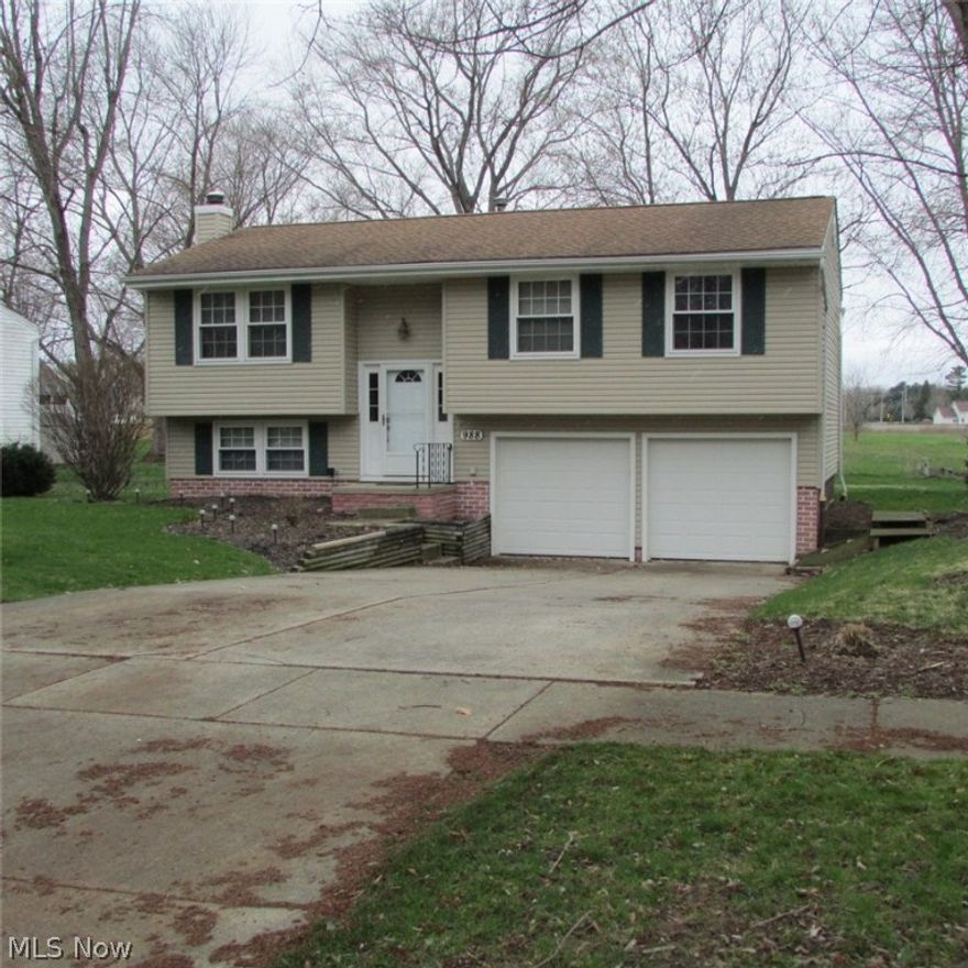 Updated awesome home, open floor plan, vaulted ceiling in Living Room, spacious dining area with sliding glass door to deck. Kitchen has ceramic flooring, granite counter-tops. cherry, shaker style cabinets, stainless steel appliances. Three bedrooms and main bath on first floor. Bath has jetted tub with heated ceramic flooring. Lower level has spacious Family Room and half bath. Large deck off rear of house. Spacious back yard with storage shed.