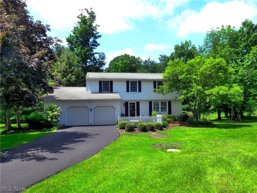 This original owner had the builder expand this plan for a larger Family Room, Master Bedroom and garage. Wait 'til you see the Great Room with walls of windows overlooking a wooded rear yard with babbling brook! Updated Eat-in Kitchen features Cherry floors, White cabinets with Granite Counters and SS appliances. The bright Great Room is accessed from French Doors in the Family Room & Eat-in Kitchen and features windows all around and a sliding door to an elevated Deck. A walk-out lower level gives convenient access to the rear yard with a brook and 14' x 10' storage shed. Driveway completely replaced-June, 2017...and passed Geauga Health Dept. Septic Test-June, 2017! The expanded area upstairs makes for a very spacious Master Bedroom with dressing area and private bath with 4' shower. Located on a short cul-de-sac close to the Kenston School campus and just 4 minutes to the Rt. 422/306 interchange this is true country living with easy freeway/city access!!