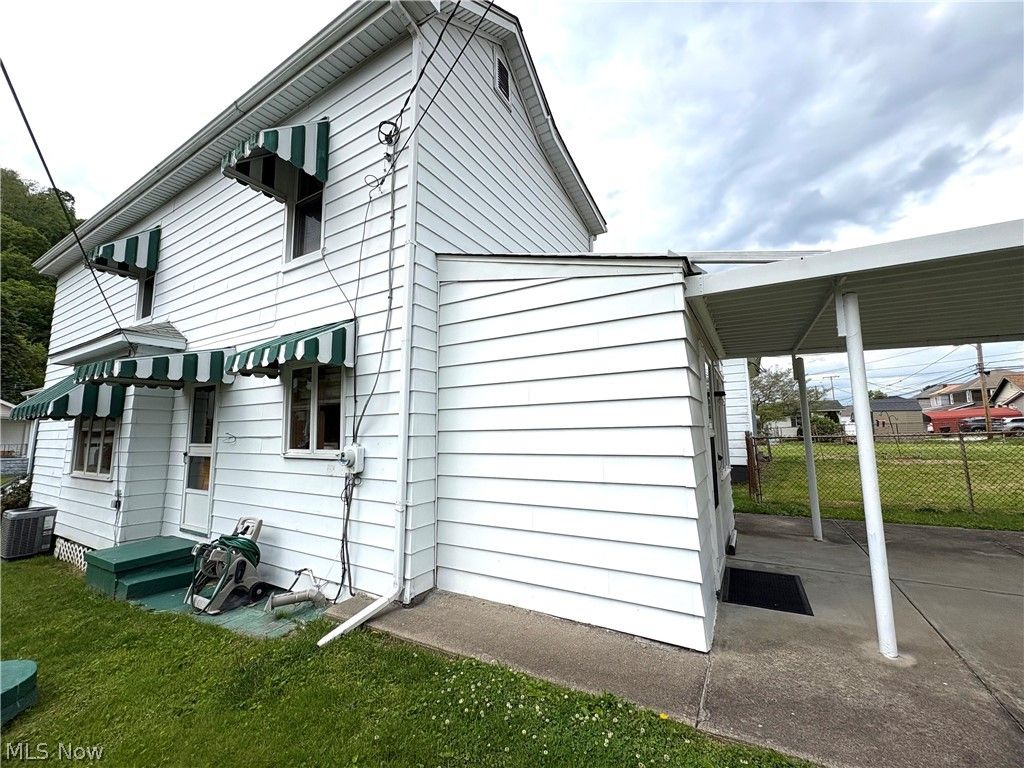 Photo of 446 Sinclair Avenue, Yorkville, OH 43971 (MLS # 5206899)