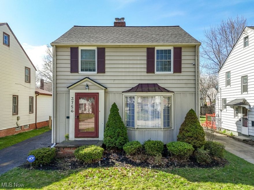Welcome to Your Dream Home at 3754 Northwood Road! Step into this charming colonial nestled in the heart of University Heights, Ohio, and prepare to fall in love! As you enter through the front door, you'll be greeted by a warm and inviting living room, featuring a stunning bay window, a cozy fireplace, and beautiful hardwood floors that run through out the home. The dining room, complete with a built-in china cabinet, flows seamlessly into a delightful three-season sunroom. This sunroom offers a picturesque view of your fenced-in backyard, ideal for outdoor gatherings, and leads to a spacious two-car garage. The updated kitchen is a chef’s dream, showcasing neutral tones, sleek granite countertops, and easy-to-clean ceramic floors. Plus, all stainless steel appliances are included. Head upstairs to discover three inviting bedrooms and a beautifully updated full bathroom. Need extra space? The unfinished third floor is perfect for storage or can be transformed into a fourth bedroom to suit your needs. The fnished lower level is a fantastic bonus, featuring a cozy fireplace and a laundry area equipped with a washer and dryer. You'll also appreciate the convenience of a half bath at the top of the stairs. Location is everything, and this home doesn’t disappoint! You’ll be just minutes away from shopping, dining, Case Western Reserve University, University Circle, downtown Cleveland, John Carroll University, Fairmount Circle, and major hospitals. And don’t forget about the new community park just down the street—perfect for leisurely walks and family fun! Don’t miss out on this incredible opportunity—schedule your showing today!
