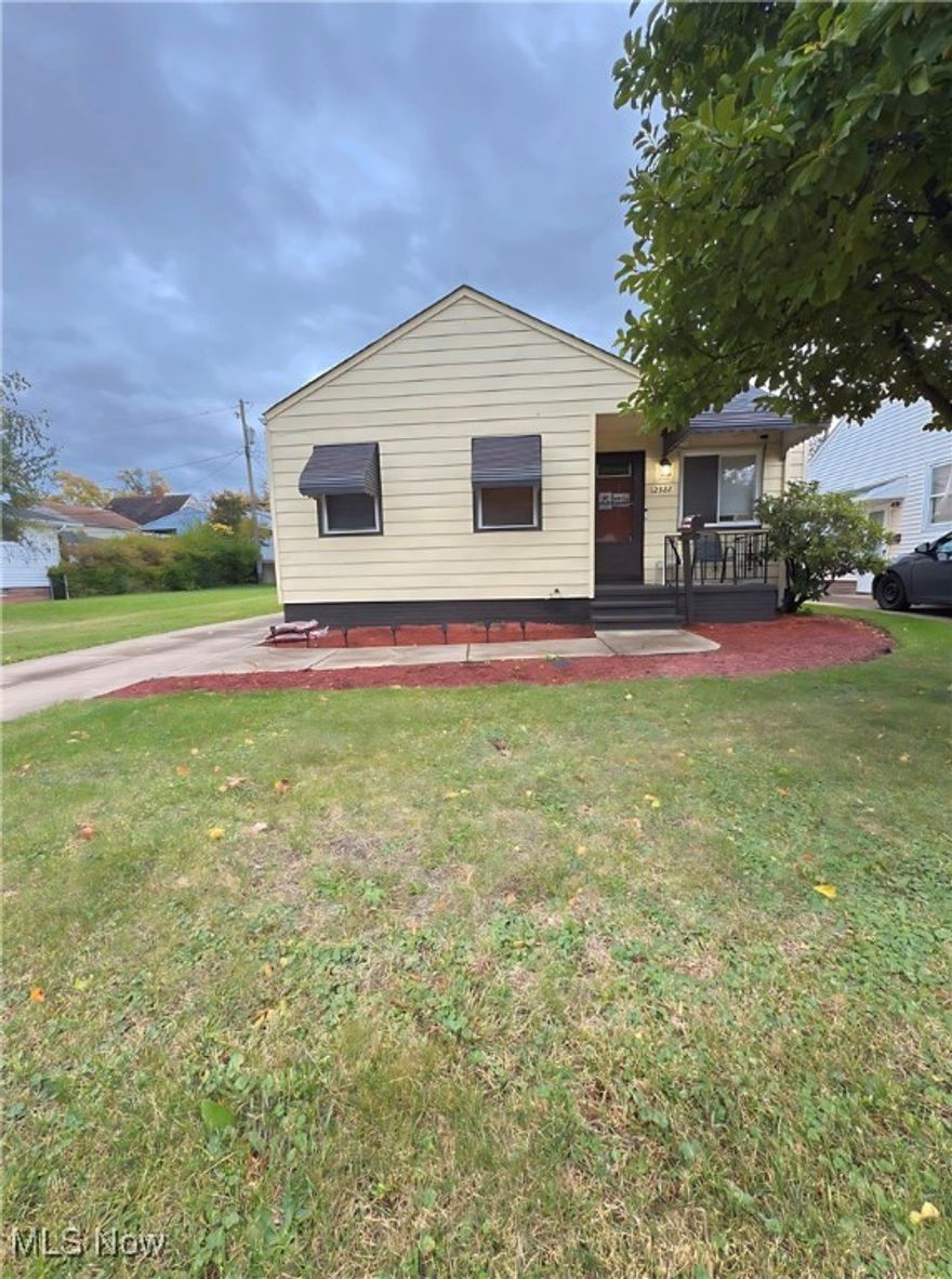 Welcome to 12322 Garland Ave, Garfield Heights Oh 44125. A Cozy and well-maintained 2 bedroom, 1 bath home perfect for first time home buyers, downsizers or investors. This charming property offers both comfort and convenience with modern upgrades and classic character. Come inside to find a bright and inviting living space with plenty of natural light. The kitchen comes equipped with a refrigerator and stove, ready for your next home-cooked meal. Enjoy year-round comfort with central air conditioning and peace of mine with a newer roof. Outside, the home features a freshly landscaped yard, a two car garage, and a paved driveway with ample parking. The cozy front porch is perfect for your morning coffee or evening relaxation. This home is move in ready and conveniently located near local shops, schools, and parks--this home is a must-see!