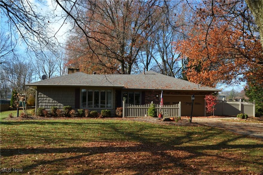 Welcome to this sprawling 2500 square foot ranch. This home has been extensively remodeled and expanded by a custom builder. The single level layout includes three bedrooms, 2 1/2 baths, and sits on a beautifully wooded and landscaped .88 acre lot with a stamped patio, garden area, storage shed, and fenced in backyard. Perfect for outdoor entertaining.  Inside, a newer front door opens to a bright living room with large windows and a wood-burning fireplace. The remodeled eat in kitchen and dining room connect to a cozy family room featuring a gas fireplace and a French door that leads out to the patio and a peaceful backyard. A 2018 addition created a spacious bedroom with a walk-in closet and a fully wheelchair assessable bathroom with a roll in shower.  There is a door to the patio in this addition. This home offers a custom floor plan, numerous updates, abundance storage, and has been lovingly maintained. Conveniently located near banks, shopping, medical services, and freeway access, it providing the perfect balance of suburban comfort and urban convenience. Square footage and room sizes are approximate and not guaranteed. Taxes are per auditor website for 2024