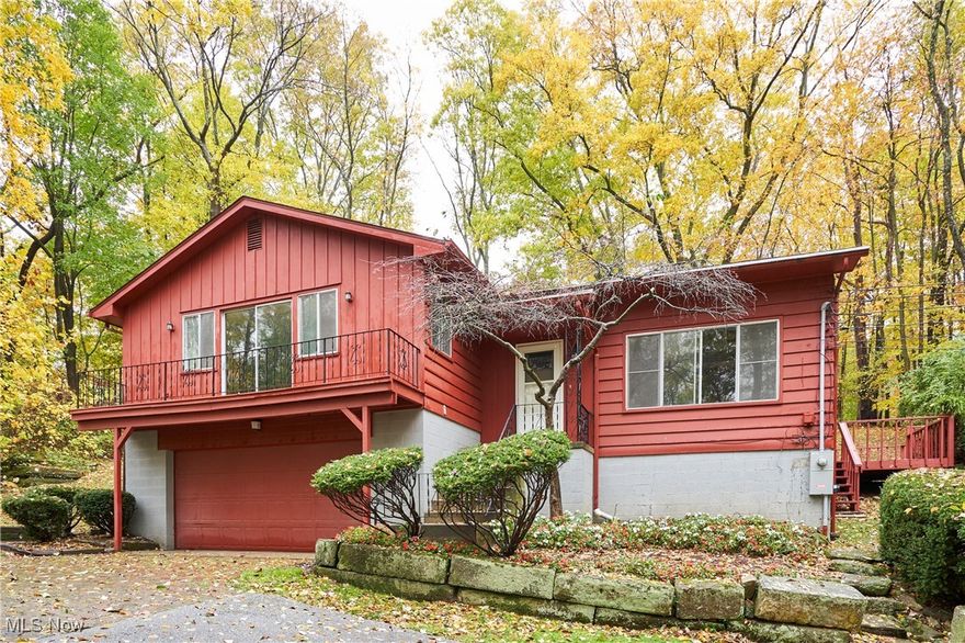Just off West Bath Road sits this incredibly wooded 3-acre property in the highly sought-after Revere School District. As you drive down the winding private drive, you’ll immediately feel a sense of seclusion surrounded by mature trees, peaceful scenery, and the sounds of nature. At the end of the drive, you’ll find a raised ranch offering over 2,000 square feet of potential with a 2-car attached garage. Inside, the home features 3 bedrooms and 2.5 full baths, ready for you to transform into your dream retreat. You’ll be captivated by beautiful long-range views framed by the surrounding woods. Each bedroom is generous in size with ample closet space. The primary suite has its own bathroom and balcony! You'll love the enclosed sunroom as well as the outdoor deck. This home is truly perfect for the nature enthusiast. If you need extra storage, no problem, this property has it. There is a large storage shed with double doors, perfect for mowing equipment, extra firewood, or more. This rare property offers the best of both worlds: ultimate privacy and close proximity to local restaurants, shopping, and top-rated schools. A truly special opportunity in a prime location. Don’t let this one pass you by—make it yours today.