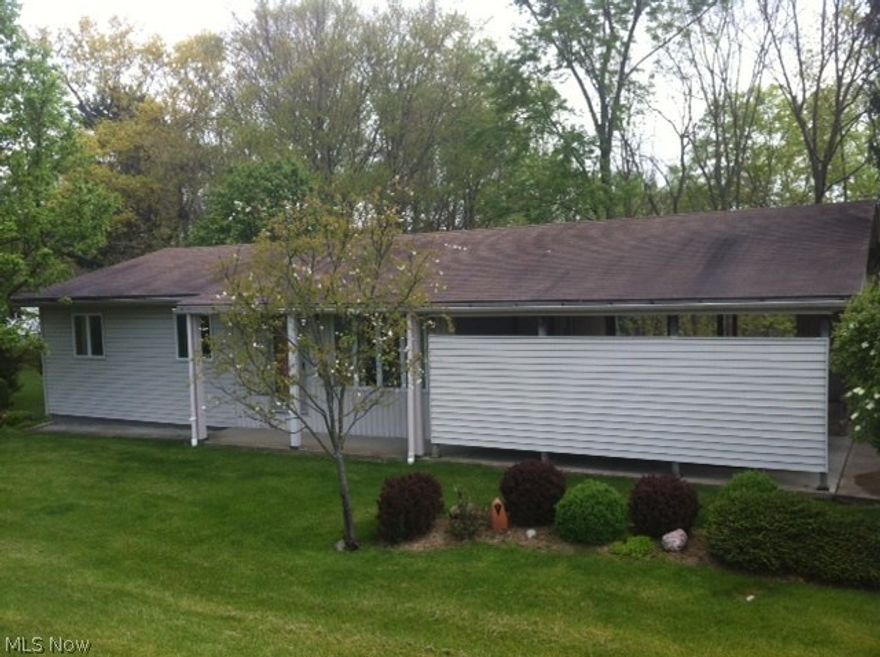 Very well maintained 3 bedroom, 2 bath home with a partially finished basement.  Large covered porches and beautiful views.