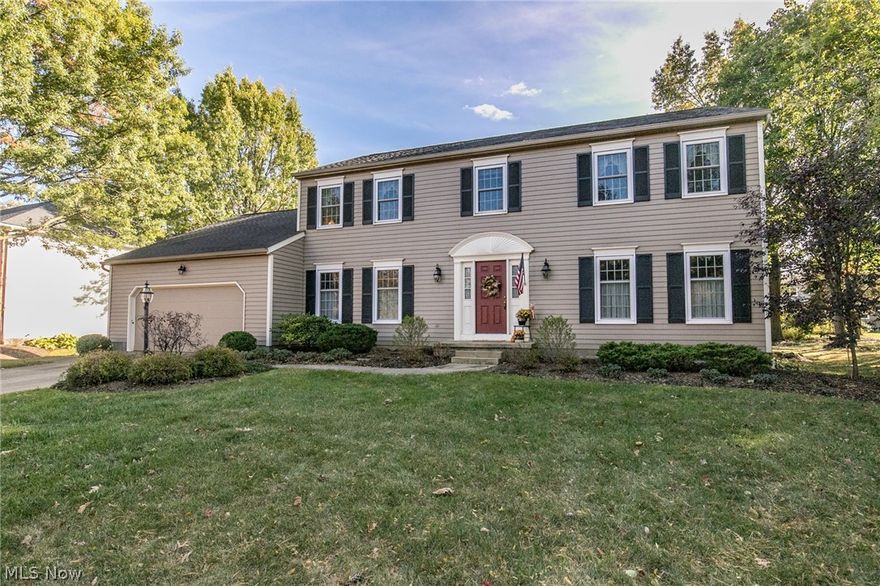 Welcome to Bath Crest Subdivision. Beautiful well manicured neighborhood situated in very convenient location. This four or five bedroom home is in meticulous condition. Nice size rooms, fabulous entertaining size kitchen, featuring granite counter tops, laminate wood floors, Island and spacious eat in area. Home offers first floor office/bedroom, first floor laundry,  oversize family room with wbfp, sliding doors to wonderful rear covered porch. The lower level recreation room is sure to please for entertaining or family gatherings. Updated window, roof and freshly painted exterior. Near shopping, parks and restaurants.