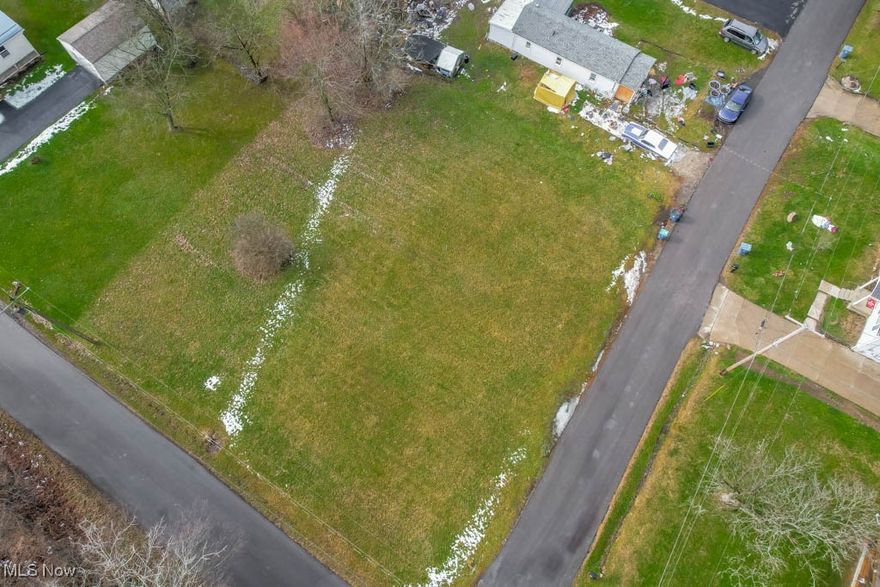 A fantastic opportunity in Norton Schools! This cleared and level double lot sits on a corner in a quiet neighborhood while keeping you close to McCafferty Park, daily essentials, and highway access. Bring your builder and start planning your dream home!