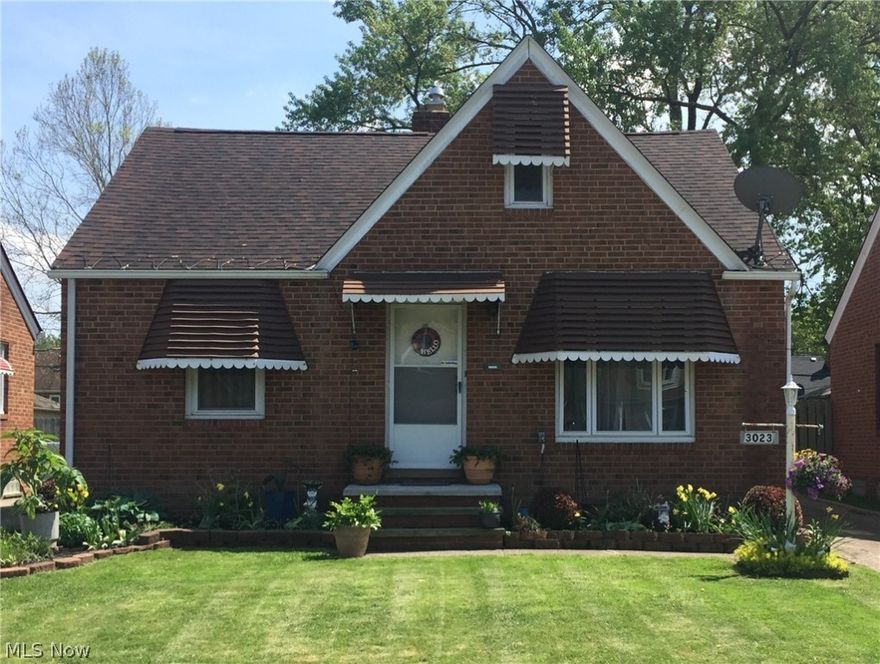 This inviting brick home is ready for you to move right in.  Beautiful perennials will greet you and your guests.  Private back yard has privacy fence on one side and along the back, while the other side is lined with tall shrubbery.  Inside you will find an eat-in kitchen, with all appliances staying, and a cozy living room providing plenty of room to entertain.  Two good sized bedrooms and an updated ceramic tiled bathroom complete the first floor.  Carpeted stairs lead you to a large third bedroom on the second floor.  Clean and dry basement is large and open enough to handle storage needs while also allowing space for media and gaming enjoyment.  A stand alone shower is also in the basement, conveniently located next to the washer and dryer, which also stay.  All windows in the house have been replaced including glass block in the basement.  Low maintenance continues to the garage with aluminum siding and garage door.  Do not just drive by this home, schedule your private showing t