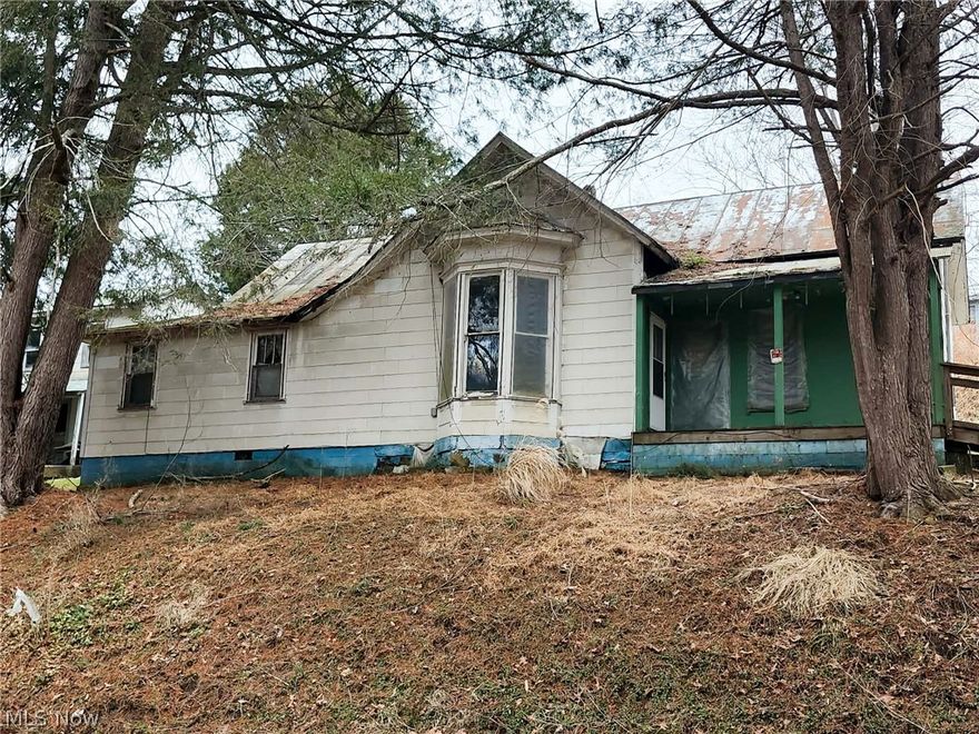 624 Court St., Harrisville, WV (Ritchie County) on approximately 2.53 acres (+/-). 2 Bed 1 bath existing home Existing in rough condition and will require extensive work to restore, or may be best suited for demolition and a new build. Crawl space only, no basement. Convenient to shopping and dining. Parking is limited/needed. Property is being sold As-Is.
