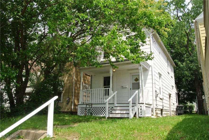 2 Bdr Single Family Colonial Akron home with shaded front porch.  Features a cozy bonus room with closet perfect for nursery, office space, or 3rd bedroom.  Eat-In Kitchen, dining room, and living room on first floor, wood floors throughout.  Appliances not included.  Tenant pays gas/electric plus $200 Water Deposit.  Laundry hookups included.