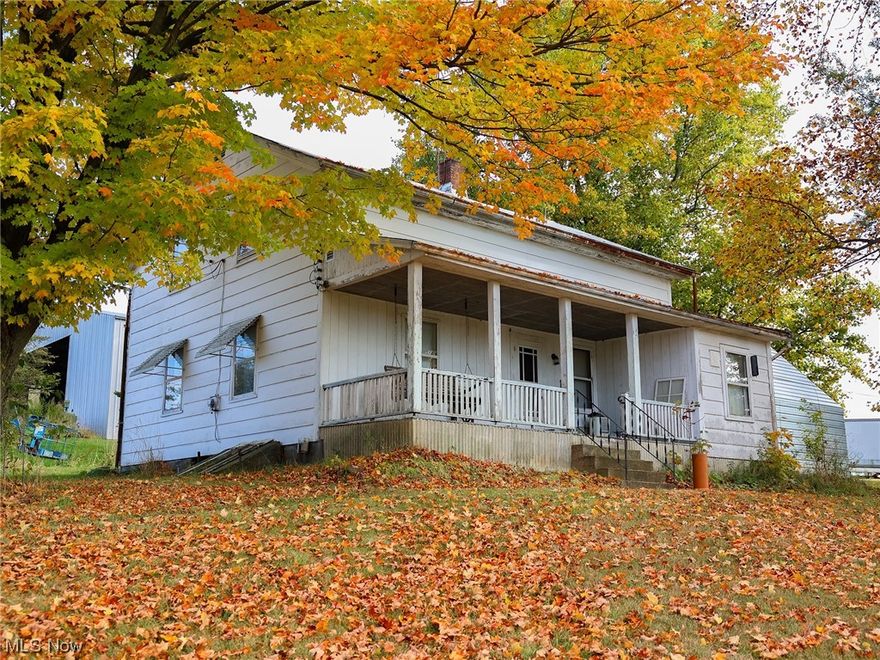 Property to be sold at onsite auction November 21st at noon.  Located in Stark County, Ohio, just northwest of Brewster, is an expansive 75+ Acre Farm presenting a unique opportunity to buy a farmstead complete with two residences and numerous outbuildings. This farm boasts a varied landscape with a gently rolling topography, encompassing approximately: 4.5 Acres of wooded land featuring harvestable timber. 56 Acres of fertile, tillable ground. 5 Acres incorporating the driveway, homestead, and various outbuildings. Structures on the property include: A historic 1882 farmhouse, spanning 1,304 sq ft, with options for heating by fuel oil or an outdoor wood burning furnace. Spring fed water and private septic. A sturdy timber-frame 38'x64' bank barn. A 30'x40' workshop. A spacious 80'x120' steel-frame machinery shed built in 1992, 20’x40’ bifold doors on premises but never installed. Several other small outbuildings typical of a farmstead. A 1997, 26' x 76' Modular home set on a full 13-course basement with an attached garage. This home is equipped with an outdoor wood burner, propane forced-air furnace (new in 2015), and Central AC. Private well & septic and extensive water filtration system. 4 Bedrooms and 2 ½ bathrooms. The home needs some TLC to make it livable. Don't miss this rare chance to own a comprehensive farmstead offered in one parcel. Attend the open house for the preview and make plans to bid as this property is set to sell Absolute, regardless of price.