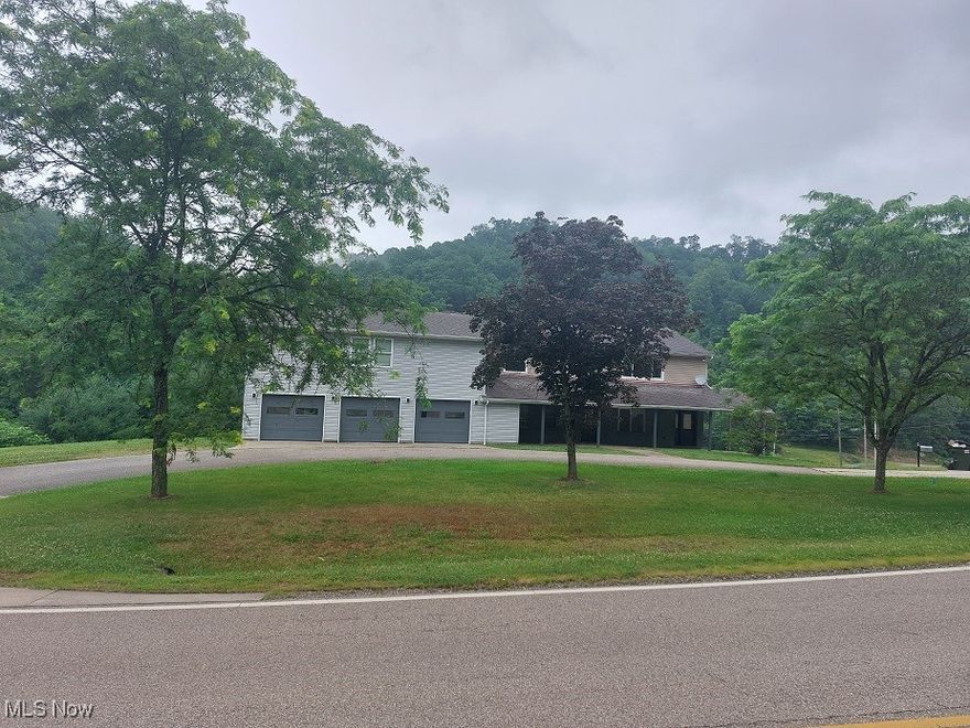 THIS 2 STORY HOME OFFERS SO MANY POSSIBILITIES.MAIN FLOOR HAS A 3 CAR GARAGE WITH KITCHEN,LIVING ROOM,2 BEDROOMS ,BATH AND LAUNDRY ROOM IN KITCHEN .PERFECT FOR IN LAW QUARTERS .2ND FLOOR HAS 3 BATH 6 BEDROOMS,KITCHEN AND LIVING ROOM.HOME NEEDS NEW PAINT AND FLOORING.BASEMENT IS UNFINISHED WITH A TOILET AND SINK PLUMBED BUT NOT WORKING. BEAUTIFUL BACK YARD TRIMMED WITH WHITE PINE TREES.CREEKS AND STREAMS RUNNING OUT SIDE THE  PINE TREES. SO PEACEFUL AND QUIET. THIS PROPERTY WONT LAST LONG.CALL TODAY FOR A SHOWING.