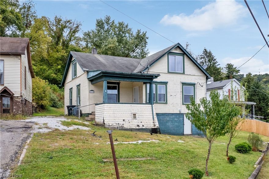 Why rent when you can own? This affordable 4 bedroom/1 bath home could be the one you are looking for! Let's hit the highlights! First floor features all new flooring, new light fixtures, large spacious dining room and living room, an updated kitchen with stainless steel appliances, first floor laundry and an updated bathroom! Second floor offers 4 bedrooms. Air conditioner and furnace only 2 years old. All plumbing updated. Last but not certainly not least, the YARD! The yard is HUGE and flat! It is hard to find a yard like this in city limits! Call today! Be home for the holidays!