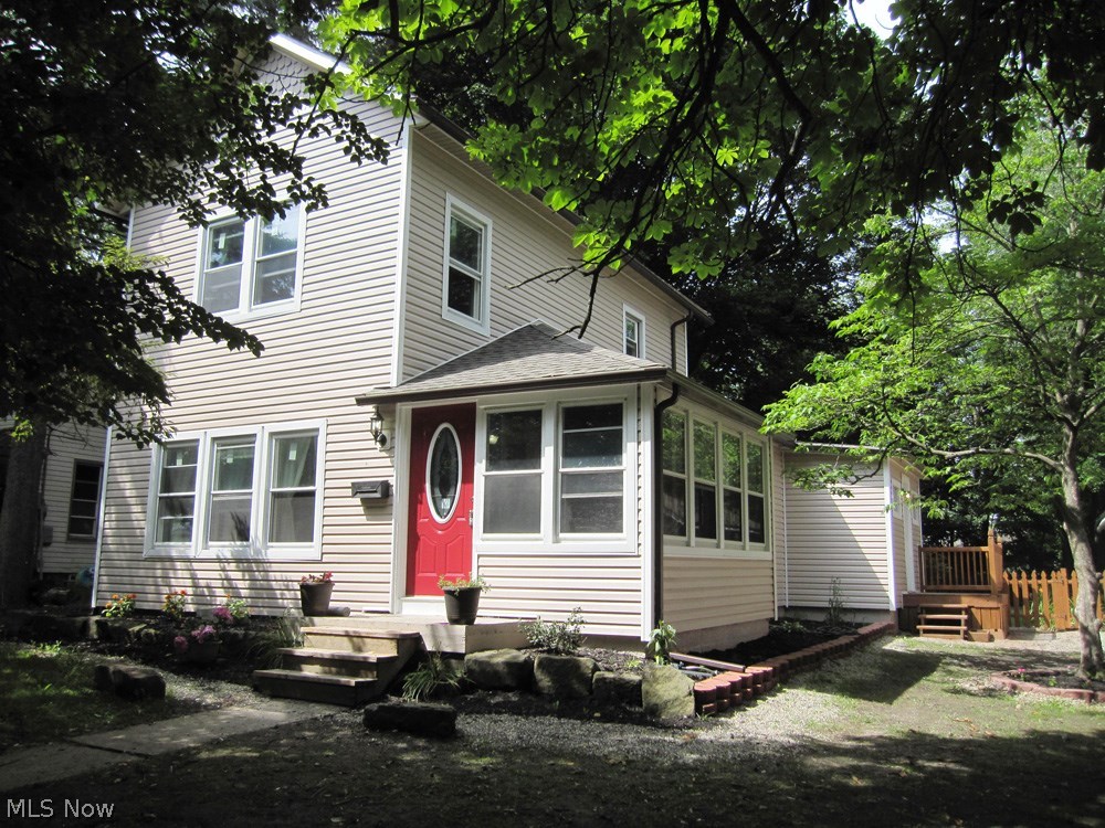 Charming and Completely updated Century home in prime location to Downtown and University Campus. This property features maintenance free vinyl siding and newer roof. Newer windows throughout including double slider doors leading to deck and spacious back yard. Beautiful hardwood floors on first floor. Virtually every room has been renovated and repainted in tasteful colors. There's a first floor bedroom and two spacious bedrooms on the second floor. High efficiency furnace plus newer central air plus there's an awesome spacious laundry room and also serves as a great mud area for family or family pets. All appliances on property are included with the sale and the Seller is offering a one year warranty with America's Preferred. Don't miss out on this lovely home!
