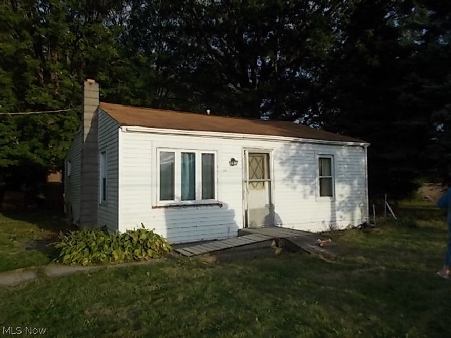 This cozy 3 bedroom, 1 bath home is on a nice .066 acre lot just south of Rt 113 in Amherst.  the house needs some work with the sagging floors & some new gutters but could be made into a nice home.  The 1 car garage/barn has a concrete floor.  The lot is mostly wooded but with enought room for the house & barn.  Property is being sold "As Is"