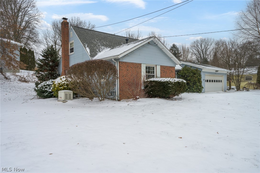 Welcome home to this beautiful cape cod nestled on a corner lot in Tallmadge. As you enter through the front door, you are greeted with all the natural light pouring through the home from the picture window in the living room. The light continues to flow into the dining room and the eat-in kitchen. Just off the dining room is a spacious owner's suite that could double as an in-law suite since there is another owner's bedroom on the first floor. The first floor also offers laundry, another full bathroom, and a family room that can host a game day gathering like no other. There is nothing better than cozying up by the fireplace while surrounded by friends and family. The second floor offers two graciously large bedrooms and a full guest bathroom. The partial basement offers a workspace that can get any job done. Circling back to the dining room, you can access the partially fenced-in backyard, a perfect place to let the furry friends out to play all while hosting a backyard BBQ. No need