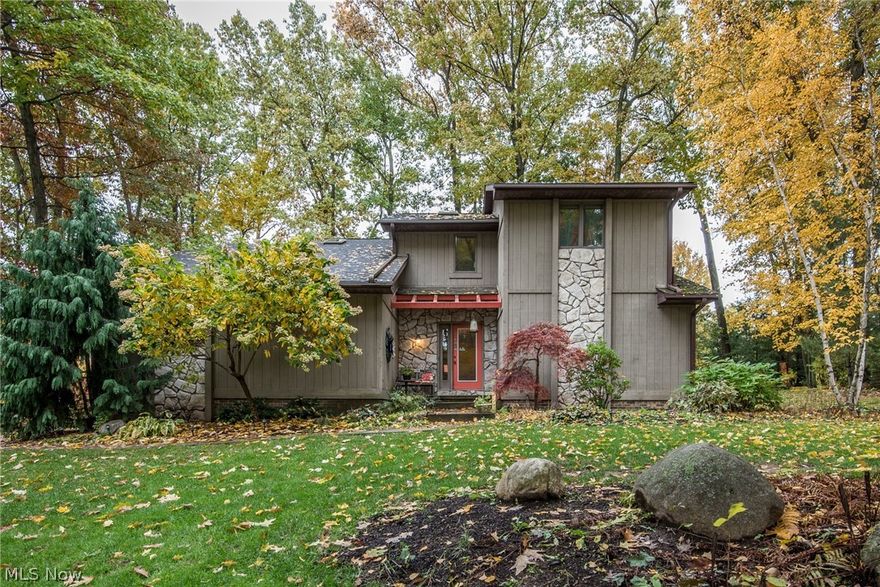 Located in Greenbriar Hills in the heart of Jackson - this very cool home is convenient to everything!  Open and unique - featuring a 1st floor master suite,  great room, open kitchen/dining area, finished lower level, and so much more!  4 total bedrooms, 2 full and 2 half baths  - lots of room for all.  The spacious great room has vaulted ceilings, stone fireplace, built-in wet bar and doors  to a wonderful screened porch!  Bright and cheery kitchen has stainless appliances, hard surface counters, a planning desk, island and lots of storage!  Second floor has 3 bedrooms ( one with an outside balcony) updated full bath and a small loft area.  The finished lower lever has lots of room for family and entertaining. Private backyard with a patio and pond....very peaceful and tranquil.  Come see for yourself all the convenience and possibilities this home has to offer !!