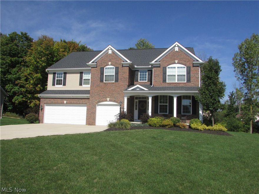 $20,000 Price Reduction!  A remarkable 4 bedroom 3.5 bath colonial in Stoneridge Reserve.  If you are looking for an open floor plan, this is the one.  The gourmet, eat in kitchen has granite counter tops, a large center island, stainless steel appliances, a walk in pantry, and desk area for personal use.  A 20x20 2 story great room features a stone fireplace and a wall of windows.  An open foyer, formal dining room, first floor laundry, and first floor office round out the main floor.  The large master suite features a garden tub and double sinks.  A second bedroom has a full bath and walk in closet.  All four of the bedrooms are large with ample closet space.  The many features include a full basement that is plumbed for a 4th full bath, a 3 car garage, and a front porch.   A stamped concrete patio overlooks the over 1/2 acre lot.