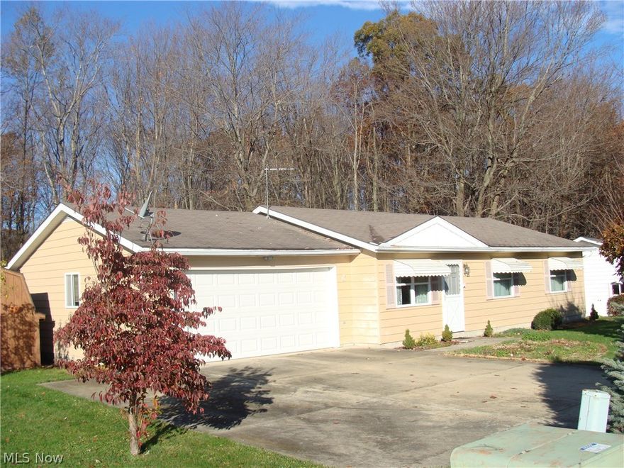 Let nature surround you with this 3 bedroom, delightful ranch home, with 2 full bathrooms.  Beautiful peaceful lot at the end of the street.  Sunroom & utility room.  All appliances are included.  2 car attached garage.  Concrete driveway.  Come see-You'll love this one!