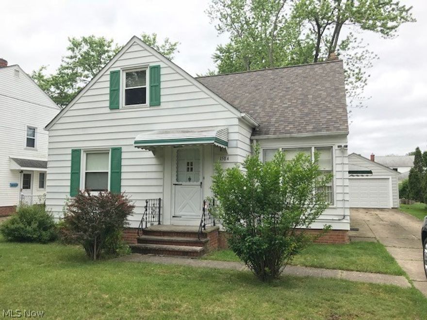 3 bedroom super clean bungalow.  Formal dining room steps out to 3 season sun room. Foyer entry into living room. 2 bedrooms and full bath also on first floor. New High efficiency furnace in 2014 plus newer hot water tank and central air. Tear off roof around 2007. Ceramic tile in bath 2003. Updated vinyl windows 8 years young. Huge second floor master bedroom that features hardwood floors with extra room for office or sitting room plus walk-in storage room. Full lower level with washer and dryer. Deep yard with 2 car garage. Close to shopping, restaurants, and easy freeway access.
