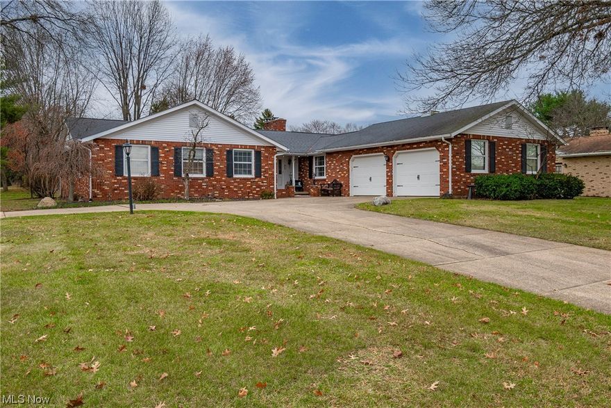 Welcome home to 2400 Mary Lou Street! This stunning 4 bedroom, 2.5 bathroom ranch is just what you've been searching for! Sitting on an oversized corner lot on a dead end street, this home boasts character at every turn and updates throughout. Enter from the front porch into the foyer where you will find a sunken living room with a cozy brick fireplace. Double doors give entry to a 3 season room that leads to the back concrete patio, perfect for entertaining. The eat-in kitchen offers a space for dining along with beautifully finished cabinetry. Four great sized bedrooms with large closets are conveniently located on the main level. The owner's suite at the end of the hall has a full bath and a large walk-in closet. Venture to the lower level and make this finished, oversized rec room your own! Potential family room, game room, or man cave! There is also a laundry area, room with work bench, plenty of storage, and interior steps to the two car garage. Notable updates include: new landscaping, furnace/AC 2019, HWT 2017, light fixtures (kitchen, hallway, master bed) 2020, paint throughout 2020. Schedule your private viewing today!