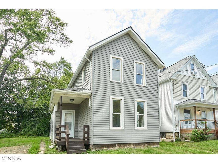 Newly renovated colonial home situated in the prime location of Akron University. This residence is conveniently close to exchange street, surrounded by various dining options and shops. Recently renovated from top to bottom, this modern colonial is awaiting its new owner. Upgrades include new siding, roof, gutters, and a welcoming front porch leading to a cozy family room. Upon entering, you will admire the new LVT flooring in the main living spaces, plush carpeting in the bedrooms, updated windows, and a brand new kitchen with elegant white shaker cabinets and granite countertops. This 4-bedroom home is perfect for both homeowners and investors. Contact us today to arrange a private viewing. Simply move in and enjoy your new home.
