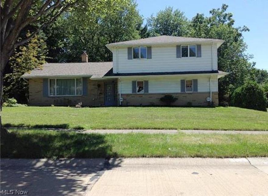 Delightful, well-kept 4 bedroom, 2 & 1/2 bath split level home. Updated kitchen with gorgeous granite counters. Hardwood floors throughout. Spacious rooms including family room with fireplace. Finished lower level. Nice patio and yard. Convenient to all amenities